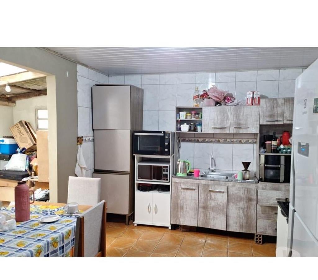 Apartamentos a venda Torres RS - Fotos para Duas casas em um terreno de esquina Escriturado