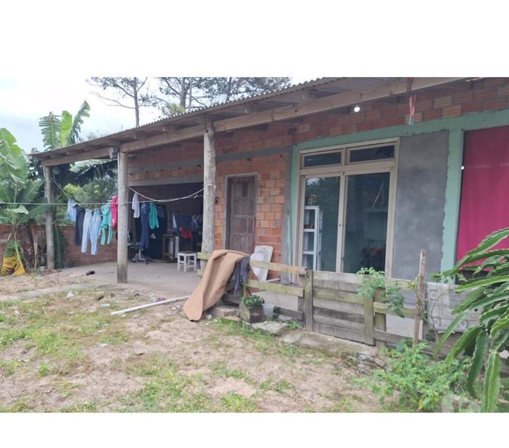 Apartamentos a venda Torres RS - Fotos para Duas casas em um terreno de esquina Escriturado