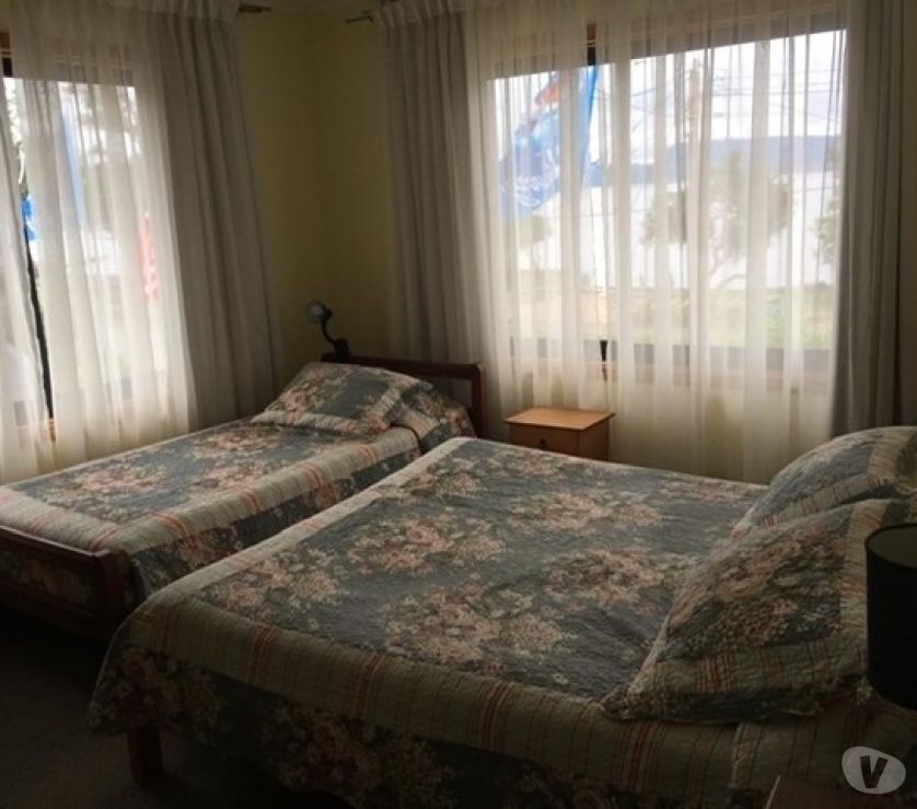 Bienes Raices Cautín Villarrica - Fotos de Vendo Hostal en Lican Ray frente a la playa