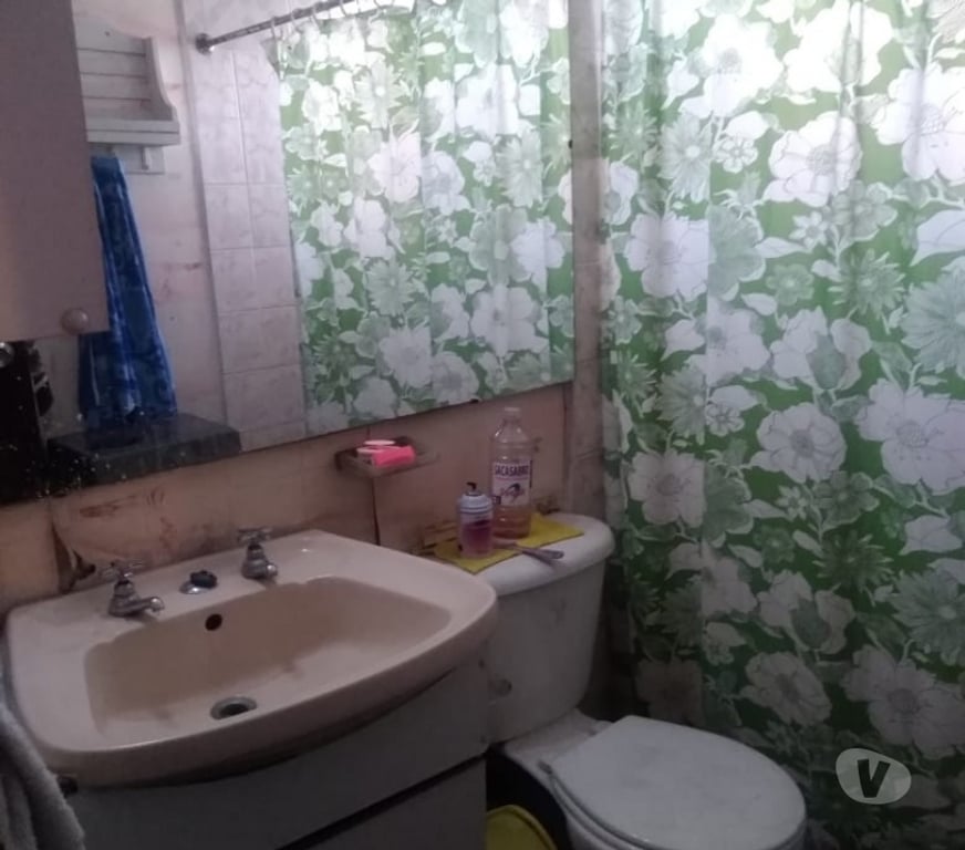 Bienes Raices Santiago La Florida - Fotos de Casa con buenos accesos de colegio, comerciales y de salud